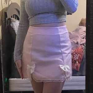 Pink Shien skirt with bows, medium size, zipper on the side.